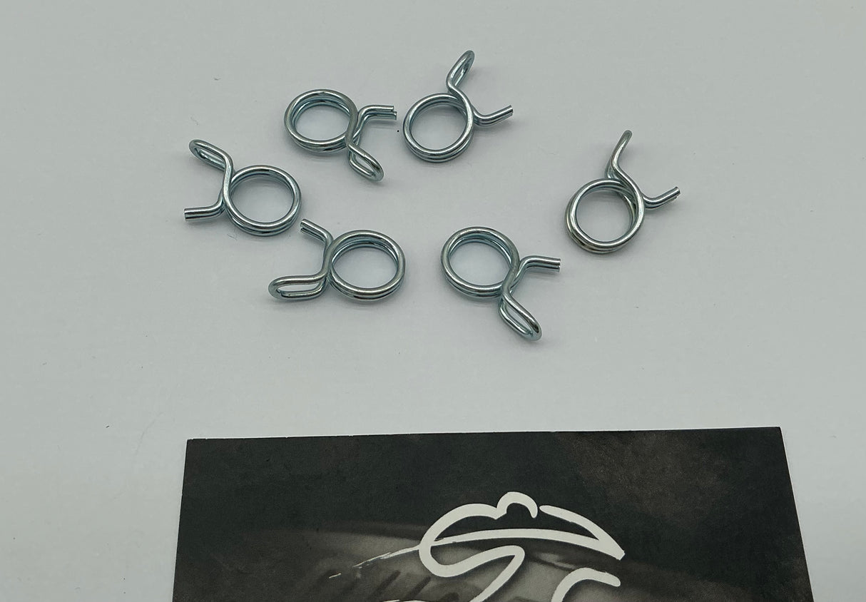 Brake hose clips- silver.