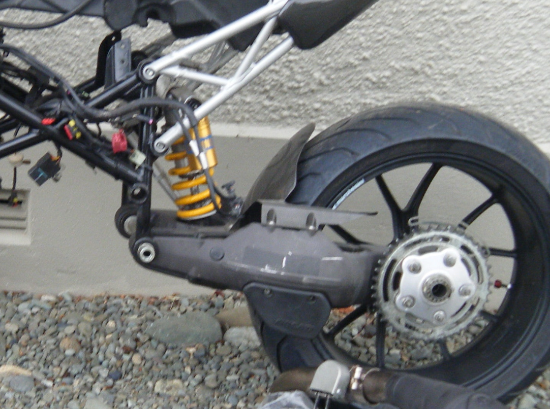 Swingarm, Hub, Eccentric, Sprocket setup - Hypermotard